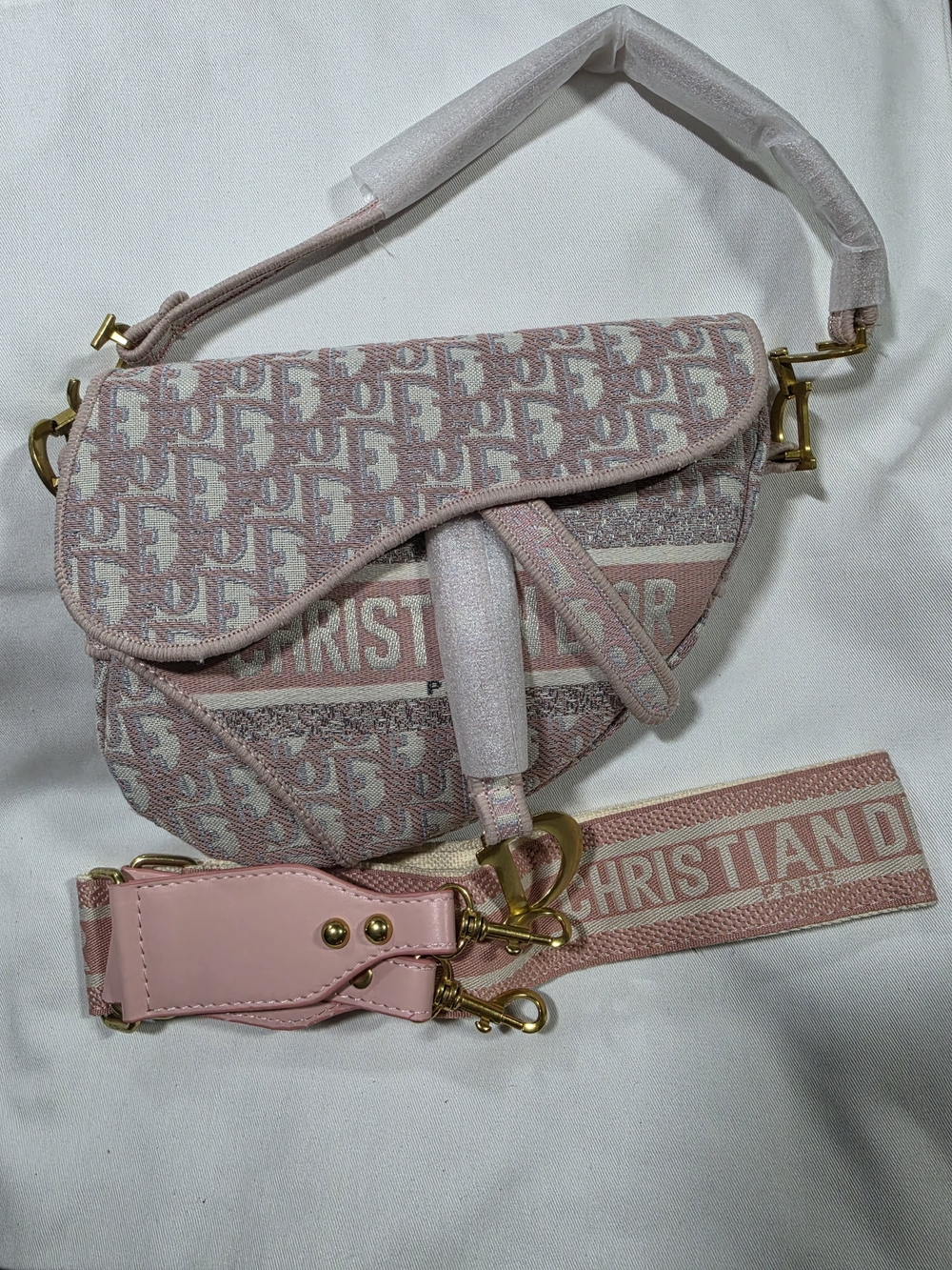 Pink Crossbody with Branded Strap